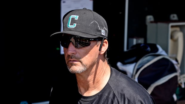 Jun 30, 2016; Omaha, NE, USA; Coastal Carolina Chanticleers head coach Gary Gilmore (14) before the game against the Arizona Wildcats in game three of the College World Series championship series at TD Ameritrade Park. Mandatory Credit: Steven Branscombe-USA TODAY Sports